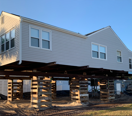 House Lifting Over Rebuilding